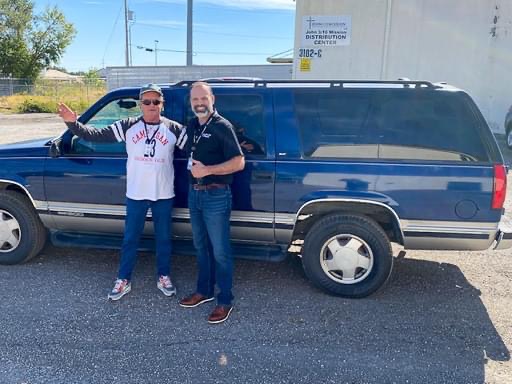 Repaired blue Chevy Suburban